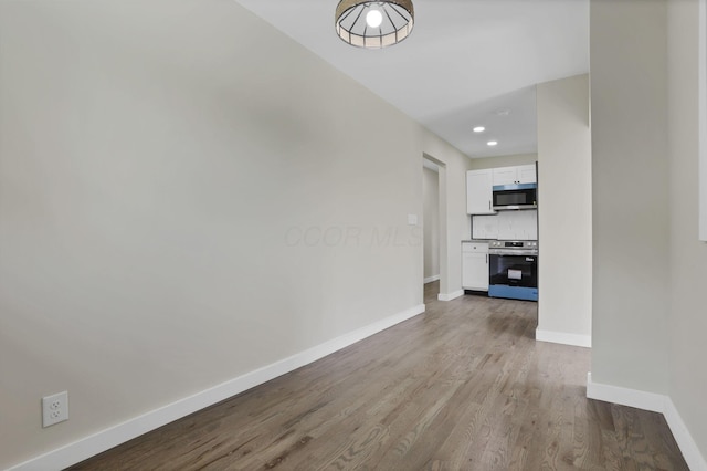 39703 Maysville Greendale Rd, Logan, OH 43138 - hall featuring wood finished floors and recessed lighting