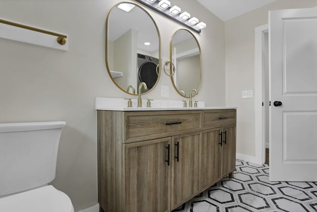 39703 Maysville Greendale Rd, Logan, OH 43138 - bathroom featuring toilet and double vanity