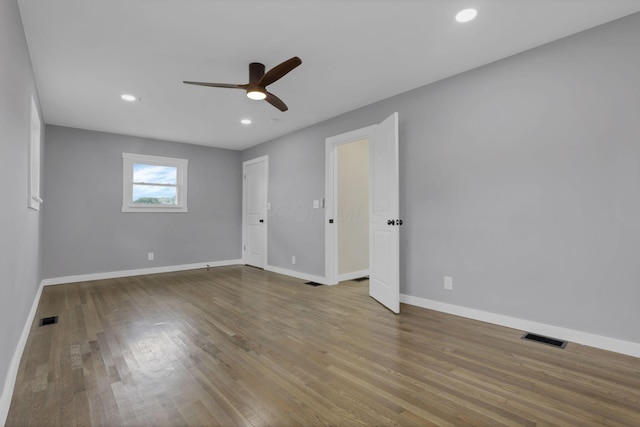 39703 Maysville Greendale Rd, Logan, OH 43138 - unfurnished bedroom with wood finished floors, ceiling fan, and recessed lighting