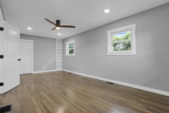 39703 Maysville Greendale Rd, Logan, OH 43138 - unfurnished bedroom featuring wood finished floors, multiple windows, recessed lighting, and ceiling fan