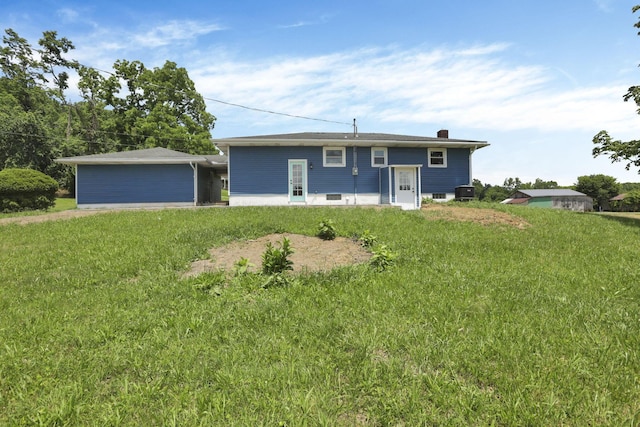 39703 Maysville Greendale Rd, Logan, OH 43138 - back of property with a lawn and a chimney