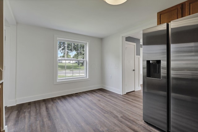 101 Circle Dr, Baltimore, OH 43105 - unfurnished dining area with dark wood-style floors and baseboards