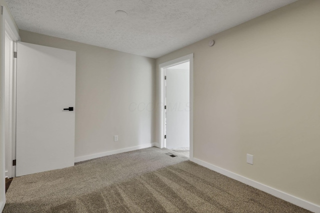 101 Circle Dr, Baltimore, OH 43105 - carpeted spare room featuring a textured ceiling and baseboards