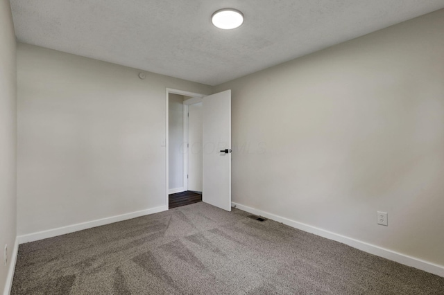 101 Circle Dr, Baltimore, OH 43105 - spare room with carpet and a textured ceiling