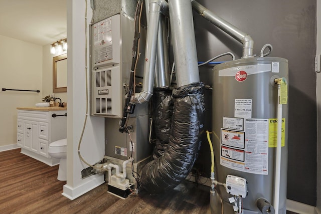 101 Circle Dr, Baltimore, OH 43105 - utility room with water heater and a sink
