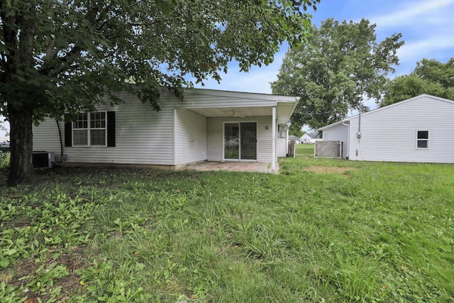 101 Circle Dr, Baltimore, OH 43105 - back of house with a lawn and a patio area