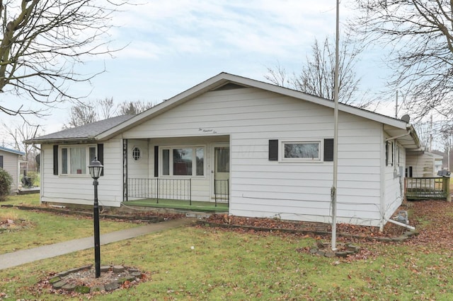 210 S Front St, Alger, OH 45812 - view of front of property with covered porch and a front lawn