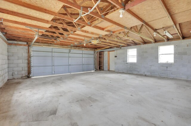 210 S Front St, Alger, OH 45812 - garage with concrete block wall