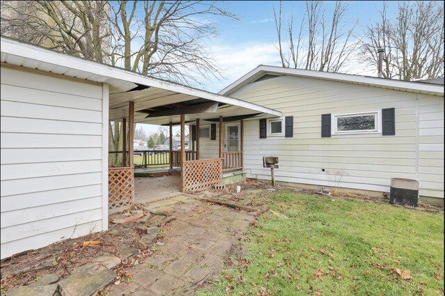 210 S Front St, Alger, OH 45812 - back of property with a lawn
