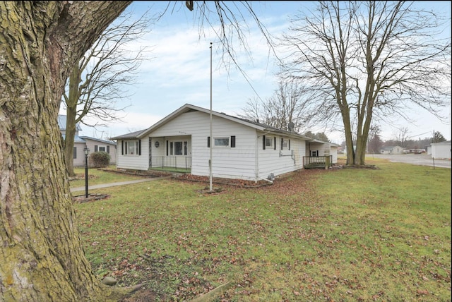 210 S Front St, Alger, OH 45812 - back of house with a yard