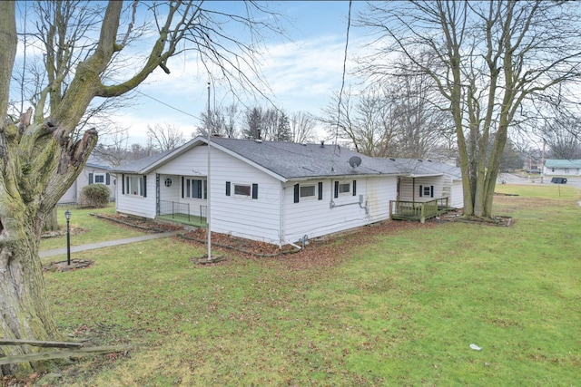 210 S Front St, Alger, OH 45812 - view of front of home featuring a front lawn and roof with shingles