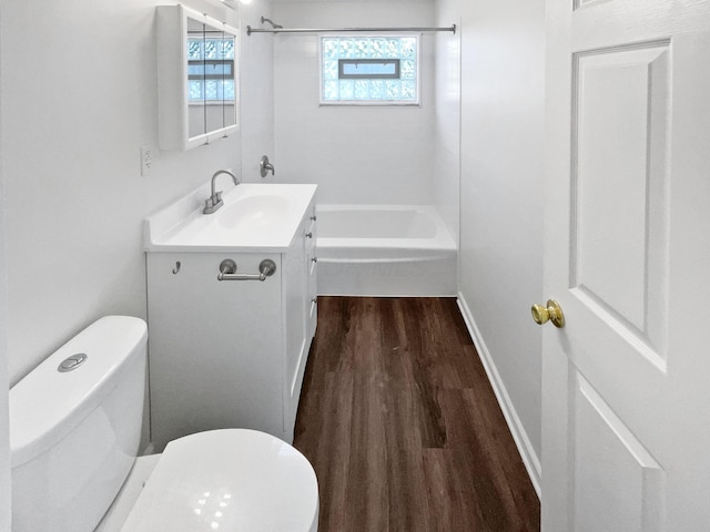 264 Lawrence Ave, Columbus, OH 43228 - full bath with vanity, wood finished floors, bathing tub / shower combination, and plenty of natural light