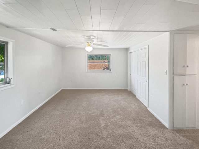 264 Lawrence Ave, Columbus, OH 43228 - unfurnished bedroom featuring carpet flooring, a closet, and a ceiling fan