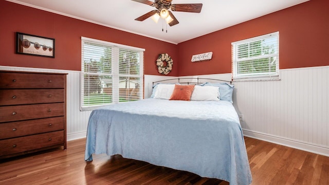 452 Jefferson Rd, Newark, OH 43055 - bedroom featuring wood finished floors, wainscoting, and ceiling fan