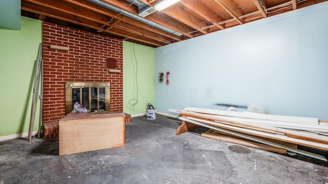 452 Jefferson Rd, Newark, OH 43055 - unfinished basement featuring a brick fireplace and baseboards