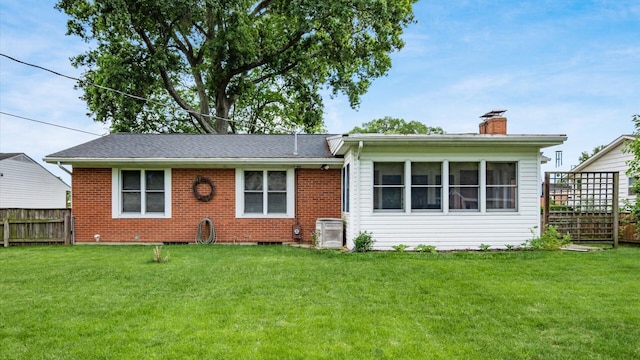 452 Jefferson Rd, Newark, OH 43055 - view of front facade with a chimney and brick siding