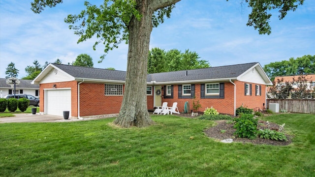 452 Jefferson Rd, Newark, OH 43055 - single story home featuring an attached garage, brick siding, and concrete driveway