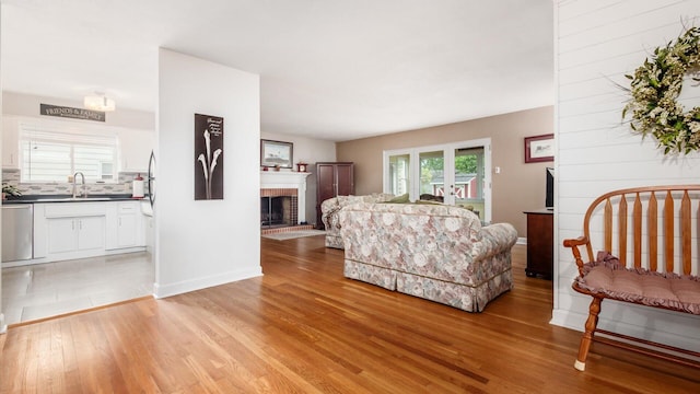 452 Jefferson Rd, Newark, OH 43055 - living room featuring light wood finished floors and a fireplace