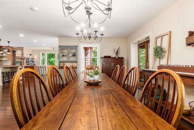 8622 Lott Rd, Marengo, OH 43334 - dining area featuring a chandelier, recessed lighting, and dark wood-style floors