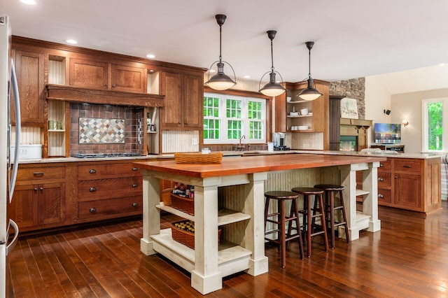 8622 Lott Rd, Marengo, OH 43334 - kitchen with open shelves, wooden counters, backsplash, brown cabinets, and recessed lighting