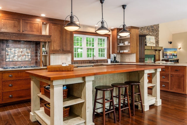 8622 Lott Rd, Marengo, OH 43334 - kitchen featuring open shelves, wooden counters, backsplash, and brown cabinetry