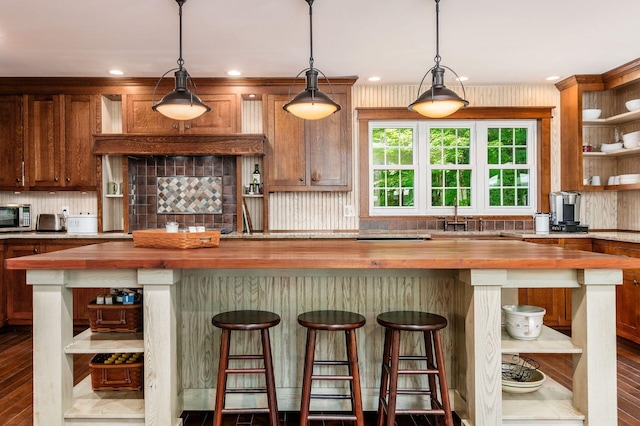 8622 Lott Rd, Marengo, OH 43334 - kitchen featuring open shelves, butcher block countertops, a center island, and decorative backsplash