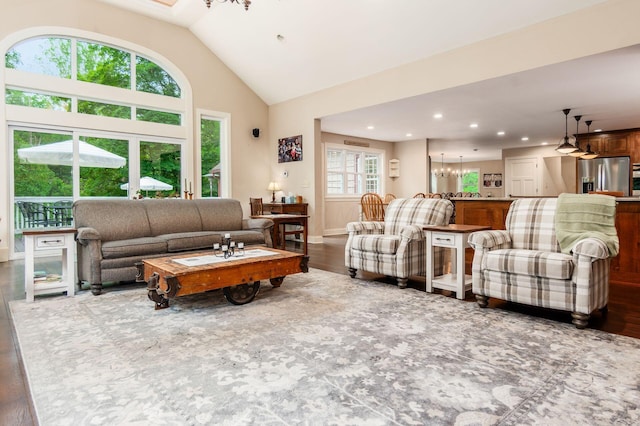 8622 Lott Rd, Marengo, OH 43334 - living area with wood finished floors, high vaulted ceiling, recessed lighting, and a chandelier
