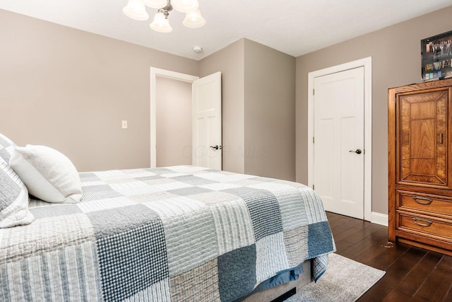 8622 Lott Rd, Marengo, OH 43334 - bedroom with wood-type flooring and a chandelier