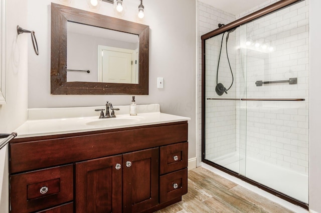 8622 Lott Rd, Marengo, OH 43334 - full bath with a stall shower, vanity, and wood finished floors