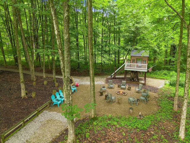 8622 Lott Rd, Marengo, OH 43334 - view of yard featuring a fire pit and a view of trees
