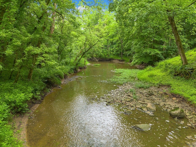 8622 Lott Rd, Marengo, OH 43334 - water view with a heavily wooded area