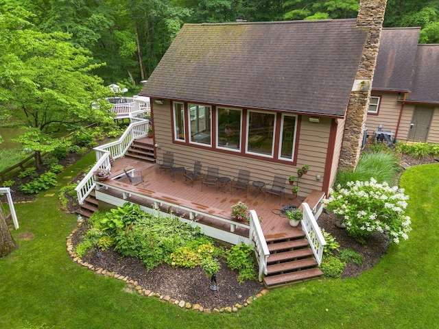 8622 Lott Rd, Marengo, OH 43334 - view of front of house featuring stairway, a wooden deck, a shingled roof, and a front yard