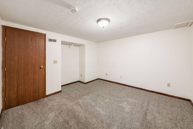 884 Annagladys Dr Unit F2, Columbus, OH 43085 - unfurnished bedroom with carpet floors and a textured ceiling