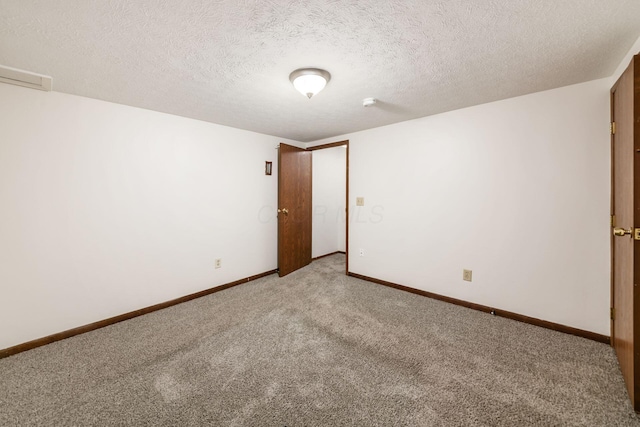 884 Annagladys Dr Unit F2, Columbus, OH 43085 - empty room featuring light carpet and a textured ceiling