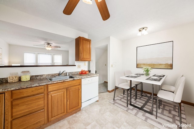 884 Annagladys Dr Unit F2, Columbus, OH 43085 - kitchen featuring dishwasher, ceiling fan, brown cabinetry, and light flooring