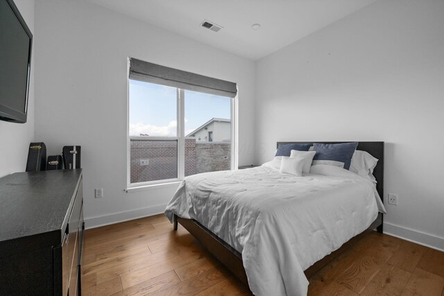 719 Civitas Ave Unit 401, Columbus, OH 43215 - bedroom with wood finished floors