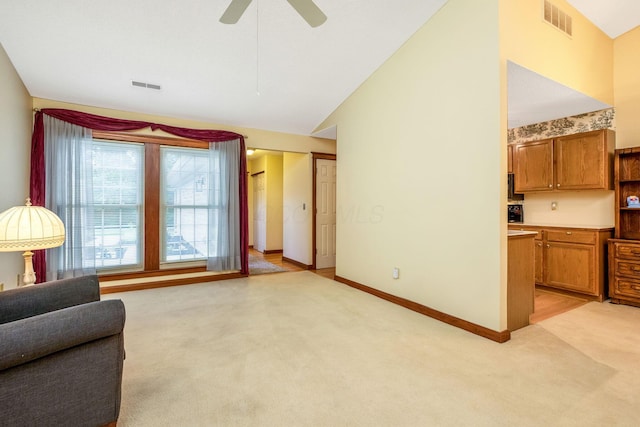 154 Oak Creek Pl, Columbus, OH 43230 - living room with light carpet, lofted ceiling, and ceiling fan