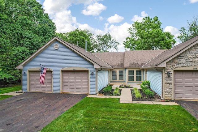 154 Oak Creek Pl, Columbus, OH 43230 - ranch-style house with stone siding, a shingled roof, a front yard, and a garage