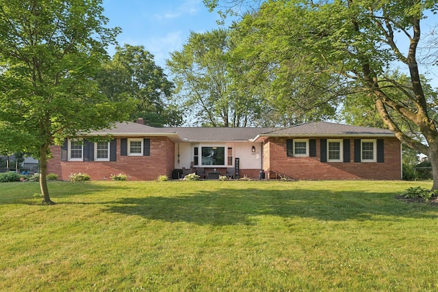 5421 Schatz Ln, Hilliard, OH 43026 - single story home featuring brick siding, a front lawn, and a chimney