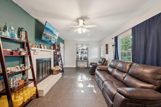 5421 Schatz Ln, Hilliard, OH 43026 - living room featuring a ceiling fan, a fireplace, and tile patterned floors