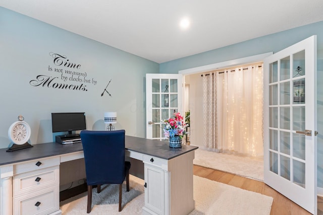 211 Talla Rd S, Delaware, OH 43015 - office area with light wood-type flooring, built in study area, and french doors