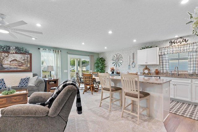 211 Talla Rd S, Delaware, OH 43015 - living area featuring ceiling fan, light wood finished floors, and recessed lighting
