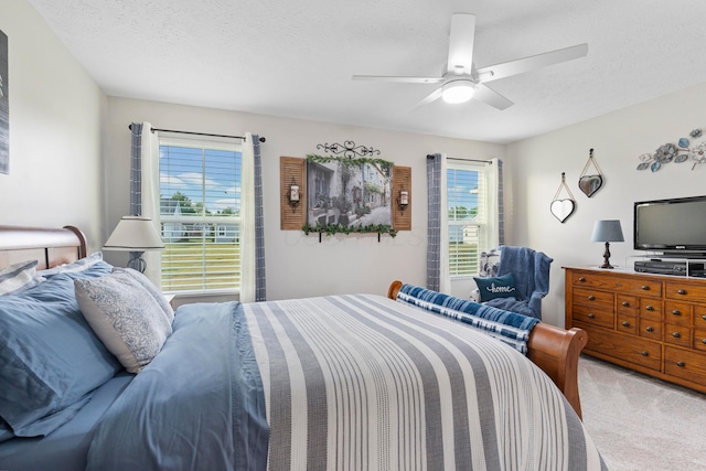 211 Talla Rd S, Delaware, OH 43015 - carpeted bedroom featuring a ceiling fan and a textured ceiling