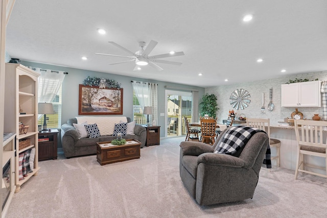 211 Talla Rd S, Delaware, OH 43015 - living area featuring light carpet, plenty of natural light, a ceiling fan, and recessed lighting