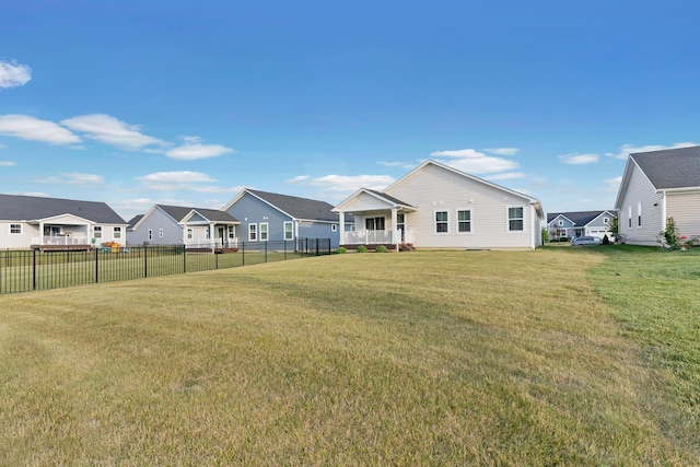 211 Talla Rd S, Delaware, OH 43015 - back of house featuring a residential view and a porch