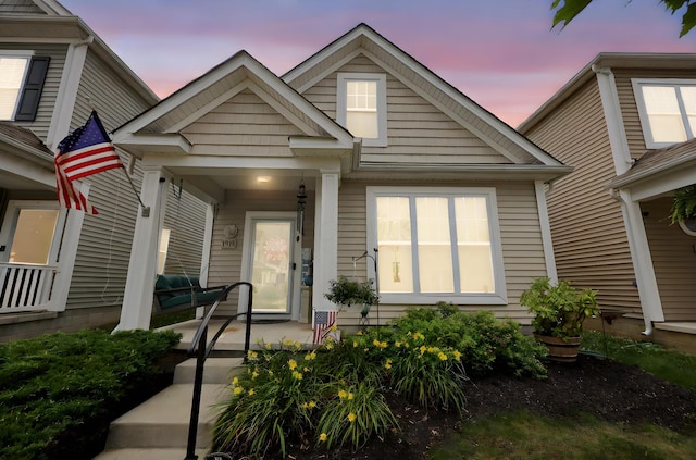 7911 Ashenden Dr, Blacklick, OH 43004 - view of front facade featuring covered porch