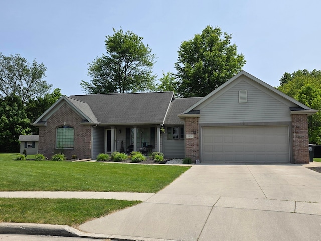 1919 Jared Pl, Lima, OH 45805 - ranch-style house with brick siding, concrete driveway, a garage, and a front yard