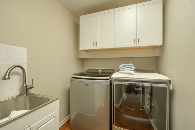 1013 Bluff Crest Dr, Columbus, OH 43235 - washroom featuring cabinet space and washing machine and clothes dryer