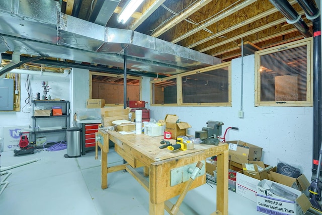 1013 Bluff Crest Dr, Columbus, OH 43235 - unfinished below grade area with a workshop area and electric panel