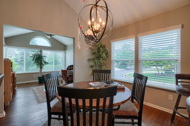 1013 Bluff Crest Dr, Columbus, OH 43235 - dining space with lofted ceiling, hardwood / wood-style floors, and a chandelier